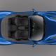 Illustration for article titled I Dont Know How The Aston Martin Vanquish S Volante Is Still Pulling It Off, But It Isem/em
